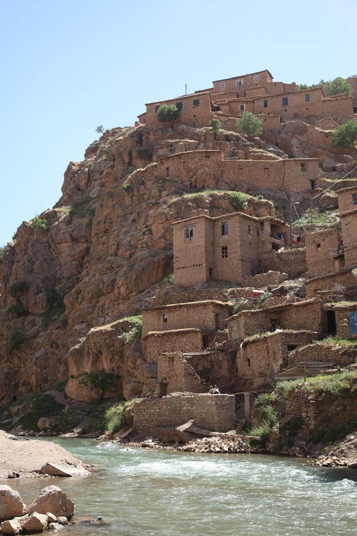 Palangan (meaning leopards in Persian) is a village located 47 kilometers north-west of Kamyaran in Iran's Kurdestan province. This village is spread over both sides of a valley. All of the houses are made of stone and like a staircase they are in a continuous pattern, i.e. the roof of one house is the yard of another house. This village is one of the most beautiful villages of the province not only because of its unique architecture, but also because of its beautiful nature. It is located beside a river which flows into the Sirwan River. This area was one of the important regions of Kurdistan from Saljooqi period on and Palangan Castle which is next to the village over a mountain bears witness to this claim. (source: Islamic Republic of Iran's Minister of Interior)