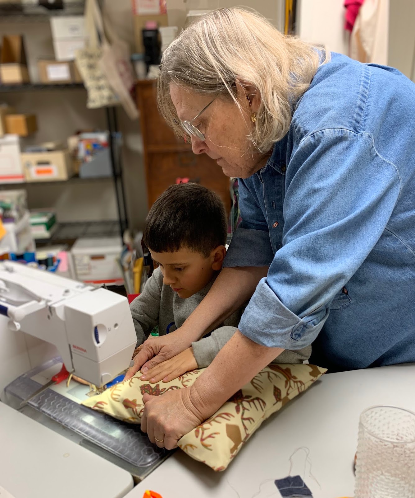 Art With a Needle Kid at the sewing machine!