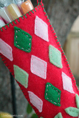 Felt, hand stitched stocking by Lisa Leggett