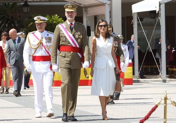 Queen Letizia of Spain wore Felipe Varela dress and Carolina Herrera suede pumps, carried Carolina Herrera bag from Camelot collection