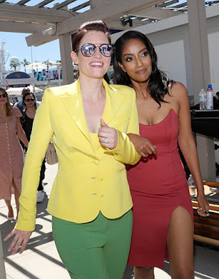 Azie Tesfai walking holding hands with her co-star