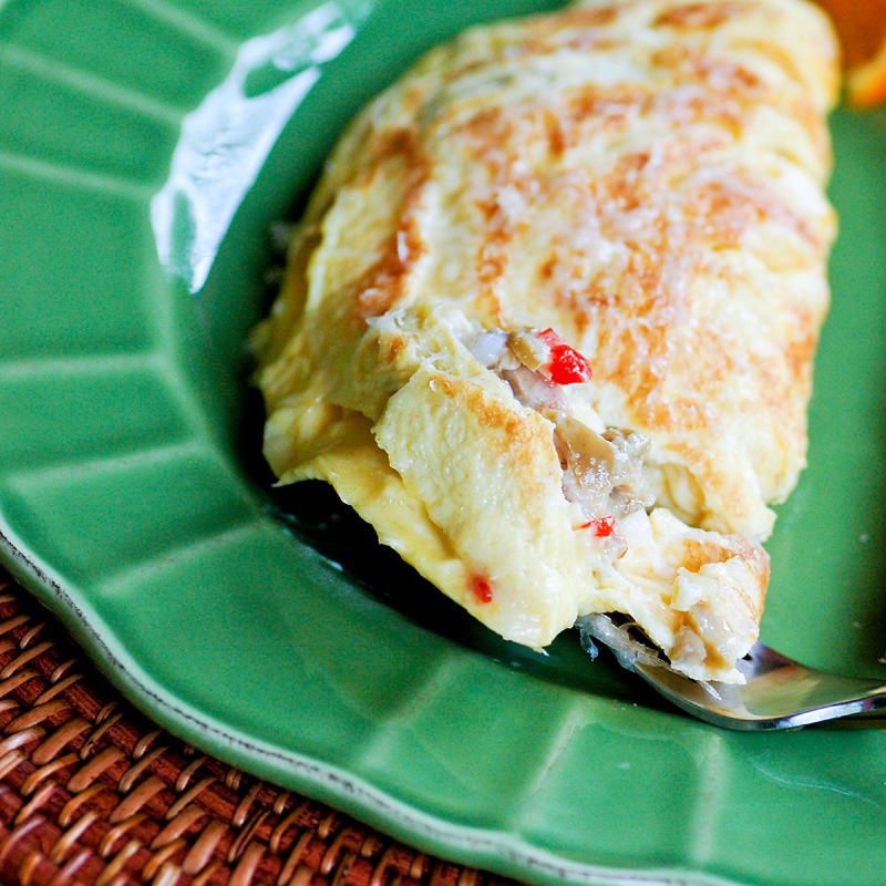 Savoring Time in the Kitchen Swiss Cheese and Green Olive Omelette
