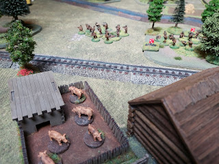 Romanian infantry move to attack the farm