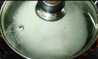Cooking appam by covering the pan