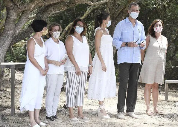 Queen Letizia wore Uterque organza dress with embroidery. Queen Letizia wore a new Macarena espadrille wedges. Queen will also go to Ibiza