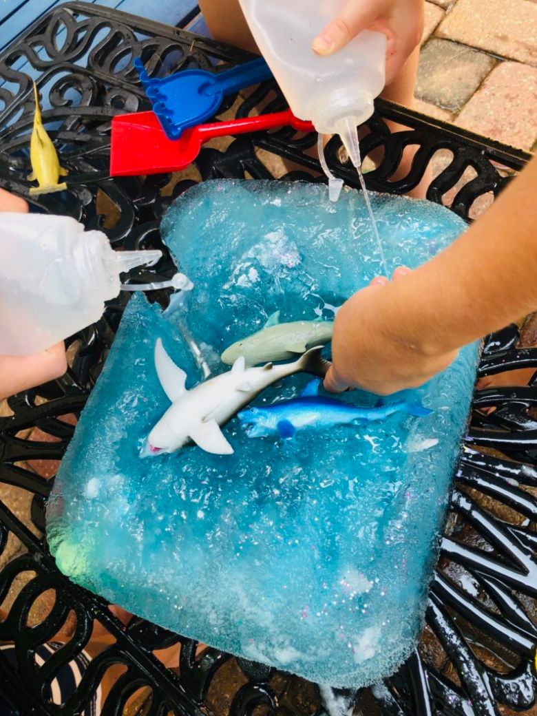 Ice block shark hunt ice play and water play for preschoolers.