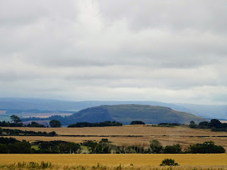 A picture of Traprain Law, a hill  near Haddington in East Lothian, which is a site connected to the legend of King Loth and his daughter Themis, the mother of St Mungo.  Picture by Kevin Nosferatu for the Skulferatu Project.