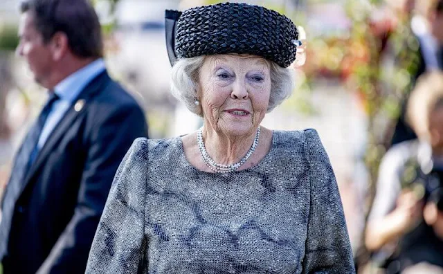 Princess Beatrix wore a grey embroidered print outfit, top and skirt at the opening of Safe Veste in Capelle aan den IJssel