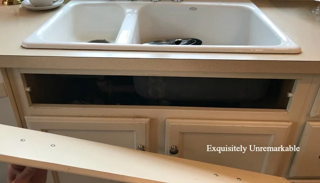 Cabinet Panel Under Sink removed exposing a hole