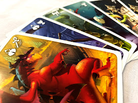 An attractive arrangement of some of the monster cards from Welcome to the Dungeon.