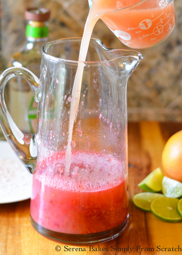 Stir in Pink Grapefruit Juice to make Pitcher Raspberry Margaritas from Serena Bakes Simply From Scratch.