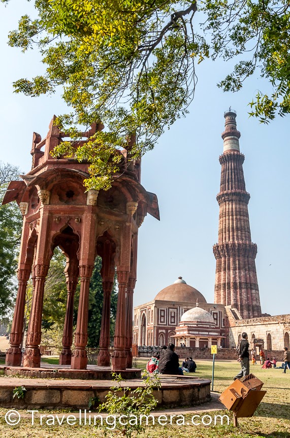 Qutub Minar is one of the most popular heritage compounds in Delhi and quite popular destination amongst tourists visiting Delhi. It's also a good places for local folks to spend quality time with their family & friends. Many times photographers and heritage explorers can be seen around Qutub Minar campus. This Photo Journey shares some of the special photographs from Qutub Minar campus. Reaching Qutub Minar has become pretty easy now. One can take Metro to Qutub Minar. The Qutub Minar Metro station is not close to the compound, but there are autos which drop folks from Metro to Qutub Minar and charge 10 rs each. If you don’t want to share the auto, most of the folks use meters and that’s reliable. It will not cost more than 30 Rs.Other good to way explore these beautiful monuments in Delhi are HOHO buses run by Delhi Tourism department. You can buy a daily pass and hop on/off to/from these buses at defined stations, which are usually very well located around the most popular tourist destinations in Delhi.Booking a Taxi to go to Qutub Minar from Central Delhi, East Delhi or Noida might be a bad idea because of slow traffic movement. I had gone through such experience twice and now try to use Metro, if possible.After Red Fort, Qutub Minar is most visited monuments in Delhi and one should expect lot of people inside Qutub Minar compound, even on weekdays. Apart from the main minaret, there are various architectural structures in this compound  having different stories associated. There are no guides around Qutub Minar now, but you can get an audio device on rent which will keep telling you about the place. Easy to use device and have good details about various spots in Qutub Minar campus.As you walk around this huge compound, you get to see spectacular beauty of the Qutub Minar from different angles. Above photograph shows one of the views of Qutub Minar through the other structures around.It's a wonderful place for photographers because of diversified opportunities to click architecture, people, landscapes and lot more. I have been part of various photo-walks here and every time it was different experience.Tourists from different parts of the world come to Qutub Minar to witness it's grandness and know about it's history. It's really strange that we don't care much to know our own history, but things have been changing for good. There are lot of social circles which inspire folks to visit such places and know more about our heritage. Mehrauli Archeological park  is another interesting place around Qutub Minar.  It's awesome to see these airplanes crossing through Qutub Minar. Although there is a huge different between the top most peak of Qutub and the flight, but such views look dramatic.Qutub is the 2nd tallest minar (73 metres) in India after Fateh Burj. Qutb Minar originally is a UNESCO World Heritage Site which is made of red sandstone and marble. The stairs of the tower has 379 steps, is 72.5 metres high, and has a base diameter of 14.3 metres, which narrows to 2.7 metres at the top. Construction was started in 1192 by Qutb-ud-din Aibakand was carried on by his successor, Iltutmish. Check out more about Qutub on Wikipedia  His expressions explain it all about the height and grandness of Qutub Minar.