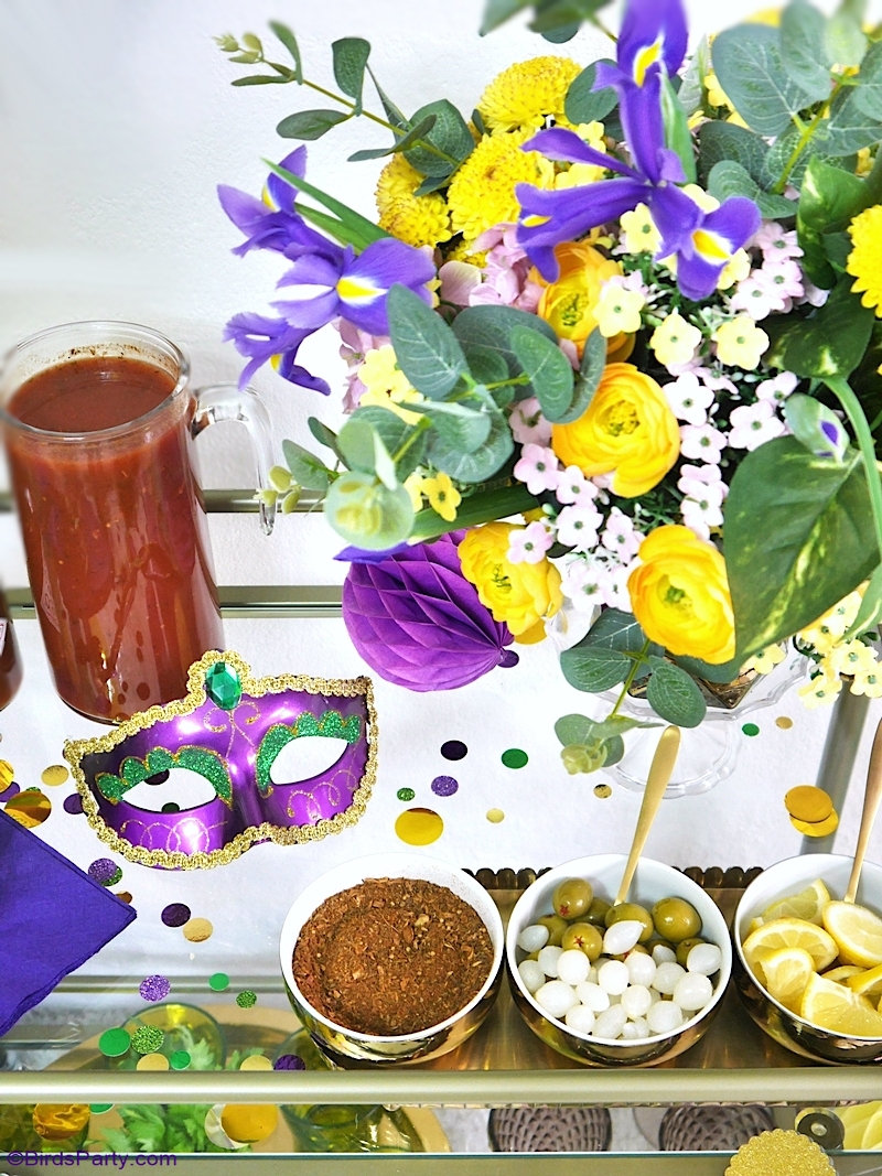 Mardi Gras Bar Cart Styling Ideas + Cajun Bloody Mary Recipe - easy DIY crafts and decor ideas + a delicious cocktail to serve at a Mardi Gras party! by BirdsParty.com @birdsparty #cocktail #cocktailrecipe #recipe #drinksrecipe #mardigras #barcart #barcartstyling #diymardigradecorations #mardigrasdecorations #mardigrasrecipes #bloodymary #bloodymarycocktail #bloodymaryrecipe #cajunbloodymary