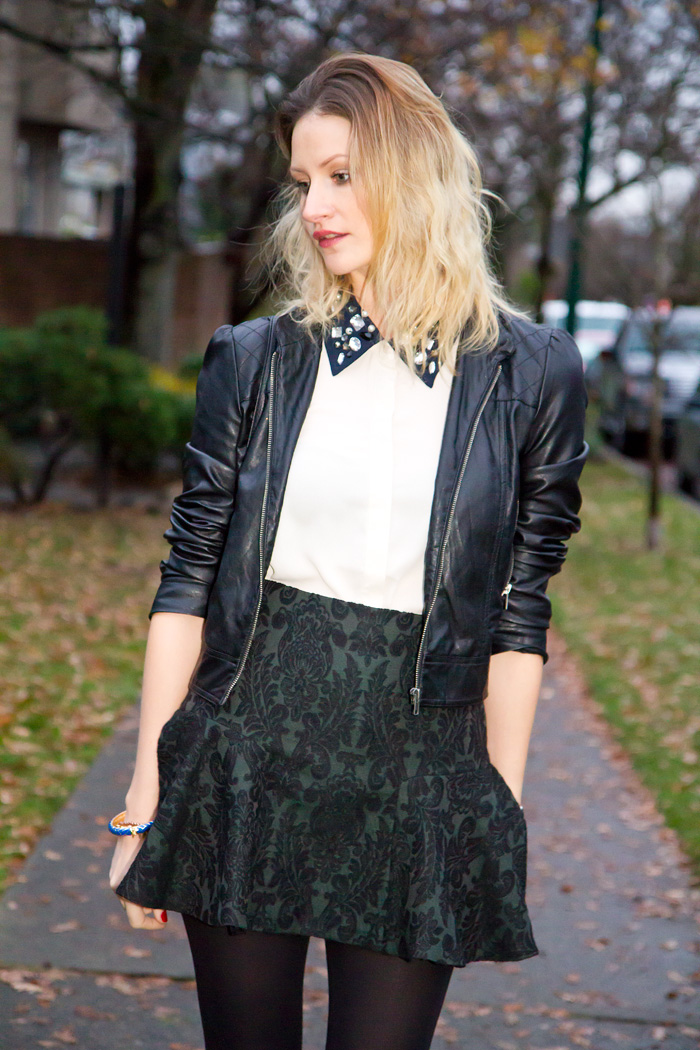 Vancouver Fashion Blogger, Alison Hutchinson, wearing Sugarlips Embedded Jewels Top, Forever 21 faux leather jacket, Zara brocade baroque skirt, Zara black ankle boots, Urban Outfitters spiked black leather bag, Stella & Dot Renegade Cluster Bracelet, True Worth Design bronze bead bracelet, and J Crew blue and gold bangle 