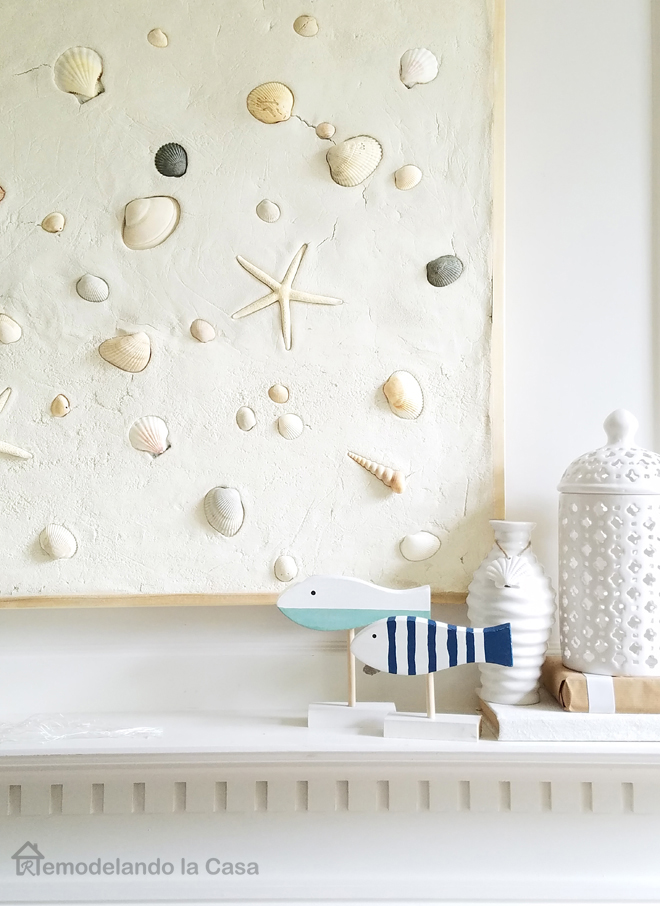 sUMMER MANTEL WITH SEA SHELLS WALL ART AND FISH SCULPTURES