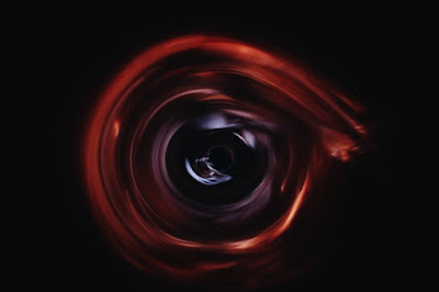 Artist's black hole representing where time goes when trying to figure out coding problem.