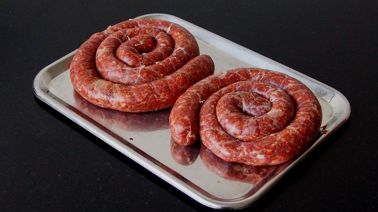 Harissa goat sausages Kitchen Exile