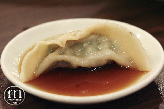 Pork and Chive Dumpling in Dipping Sauce