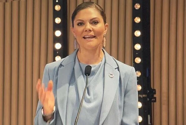 Crown Princess Victoria wore a Narina blazer, Rosaria trousers and Volon mist blue silk top, blouse from Tiger of Sweden