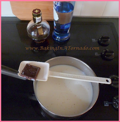 Spiked Raspberry Cocoa with Orange Whipped Cream | www.BakingInATornado.com | #recipe #cocktail