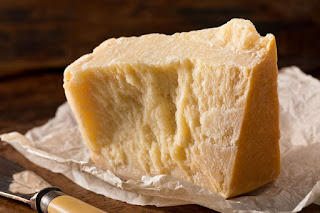 An aged authentic parmigiano-reggiano cheese 