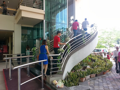 yong sheng hall muar going up the spiral stairs