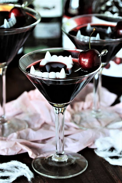 Dracula's Blood Cocktail with Vampire Teeth Image