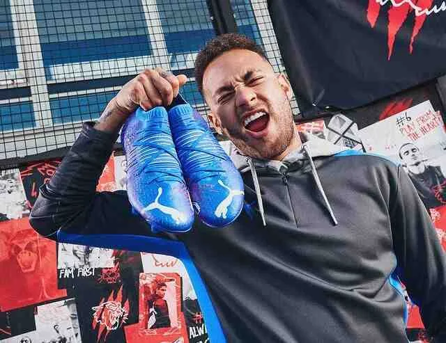 neymar holding Puma Future Z 1.2 boots
