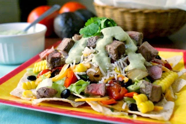 Grilled Steak and Rice Taco Salad with Creamy Avocado Cilantro Dressing | thetwobiteclub.com
