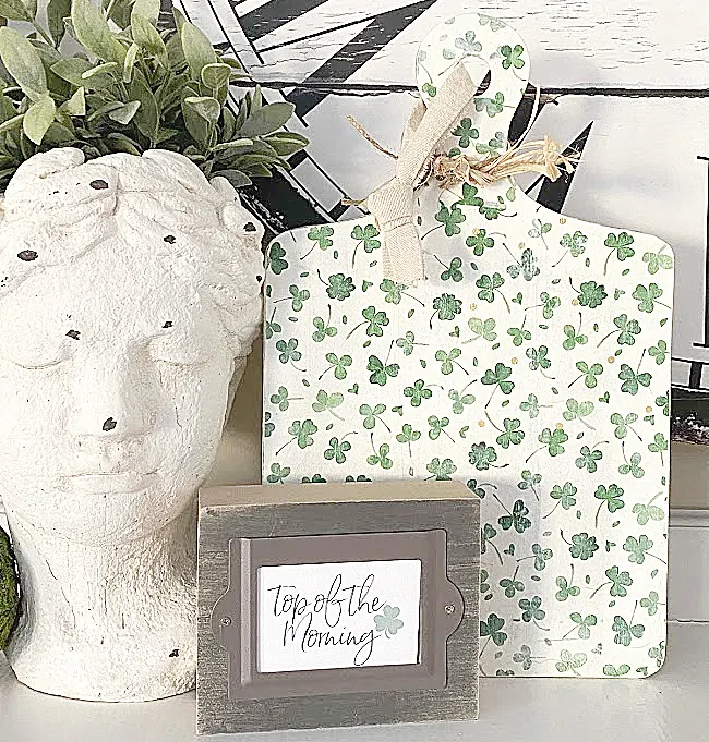 cement head, shamrock cutting board and top of the morning sign