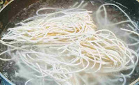 Boiling noodles in water for hakka noodles veg recipe