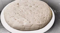 A pizza base after baking for pizza base recipe