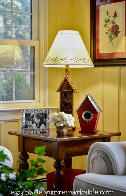 DIY Birdhouse Lamp on a table in a living room