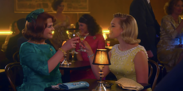 A scene from Why Women Kill. Ginnifer Goodwin and her husband's mistress are in a cocktail bar.