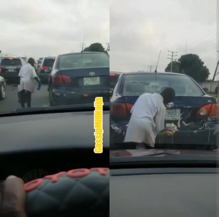 Boy Takes Advantage Of Heavy Traffic In Lagos To Open Mobile Car Wash