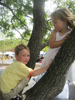 Children climbing a tree