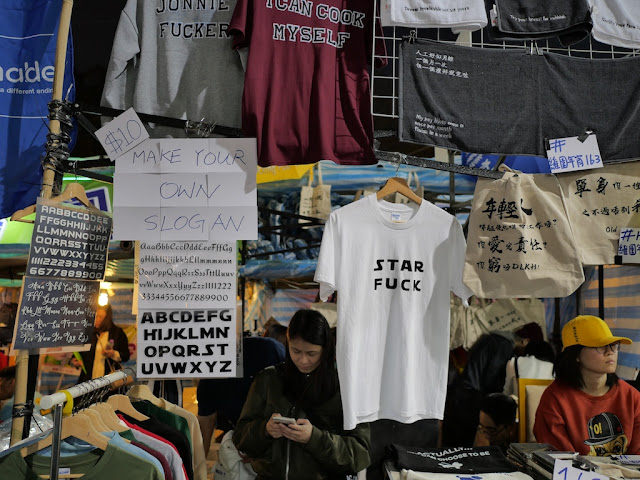 Victoria Park Lunar New Year Fair stall selling a "Star Fuck" shirt