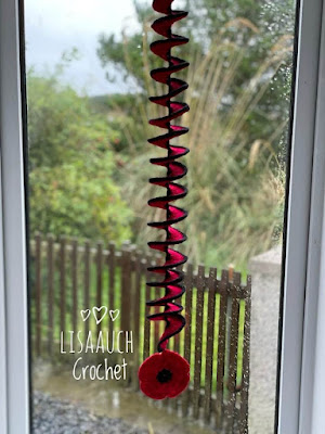 crochet poppy window decoration windspinner