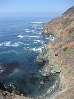 Turquoise cove with kelp along the rocky California Pacific coastline.