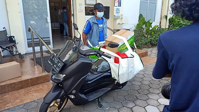mengantar paket isoman
