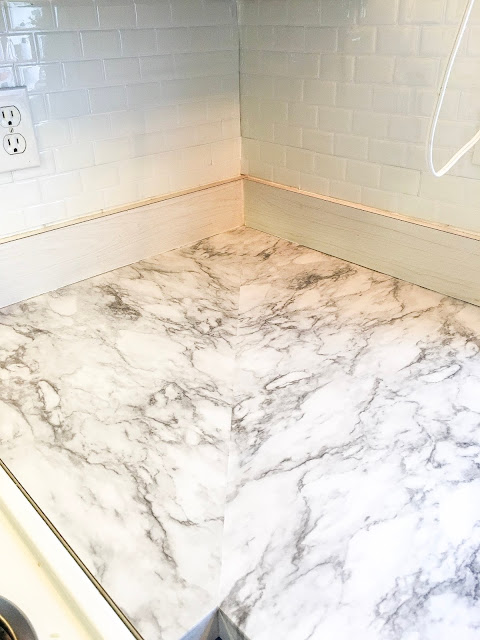Marble kitchen counter with contact paper