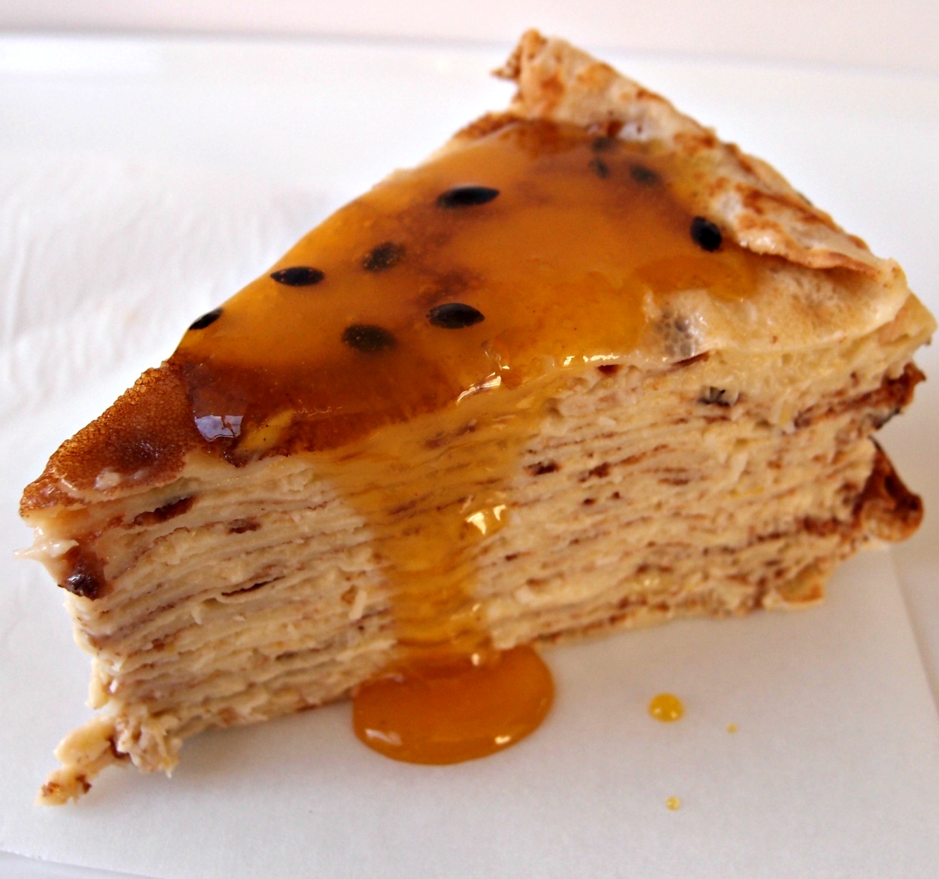 Milk and Honey Coconut Crepe Cake with Passionfruit Caramel