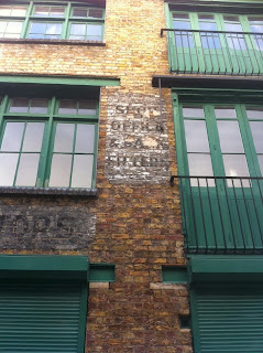 Ghost sign, Brownlow Mews, London