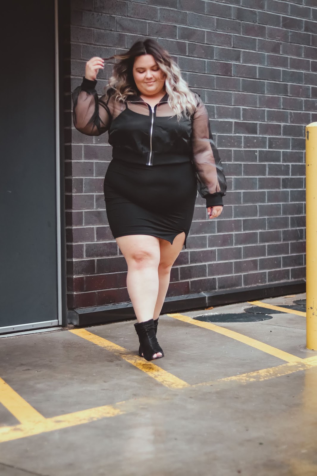 Chicago Plus Size Petite Fashion Blogger, influencer, YouTuber, and model Natalie Craig, of Natalie in the City, reviews Forever 21's cropped hoodies and bodycon mini dresses.