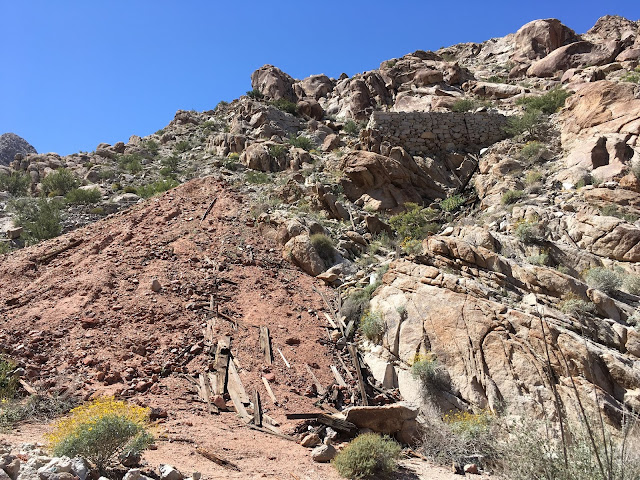 Rock tailing pile outside the main shaft of the Betty Lee Mine funnel shaped pile of rock debris near the mine shaft