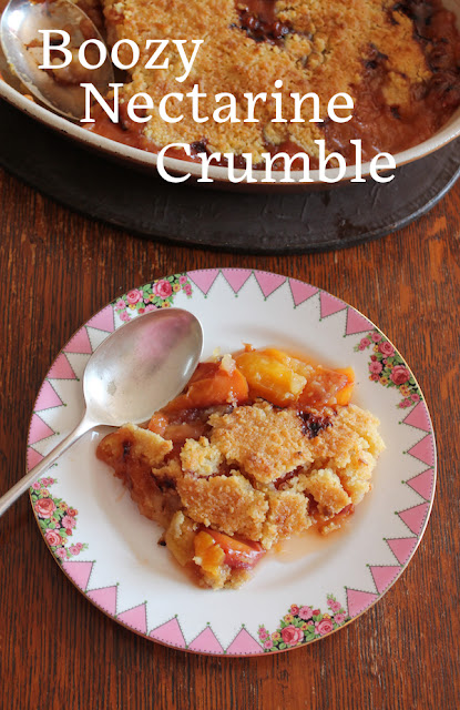 Food Lust People Love: Nectarines lavishly drenched in golden rum are topped with a mix of flour, sugar and butter to make this boozy nectarine crumble.