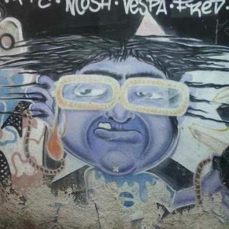 Grafite do Dr Edwagner na parede  uma favela em itaquera.