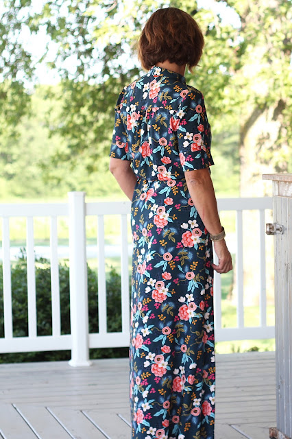 Style Maker Fabrics' Les Fleurs Birch Floral Rayon Navy sewn into a Simplicity 8084  maxi dress, designed by Mimi G - side view