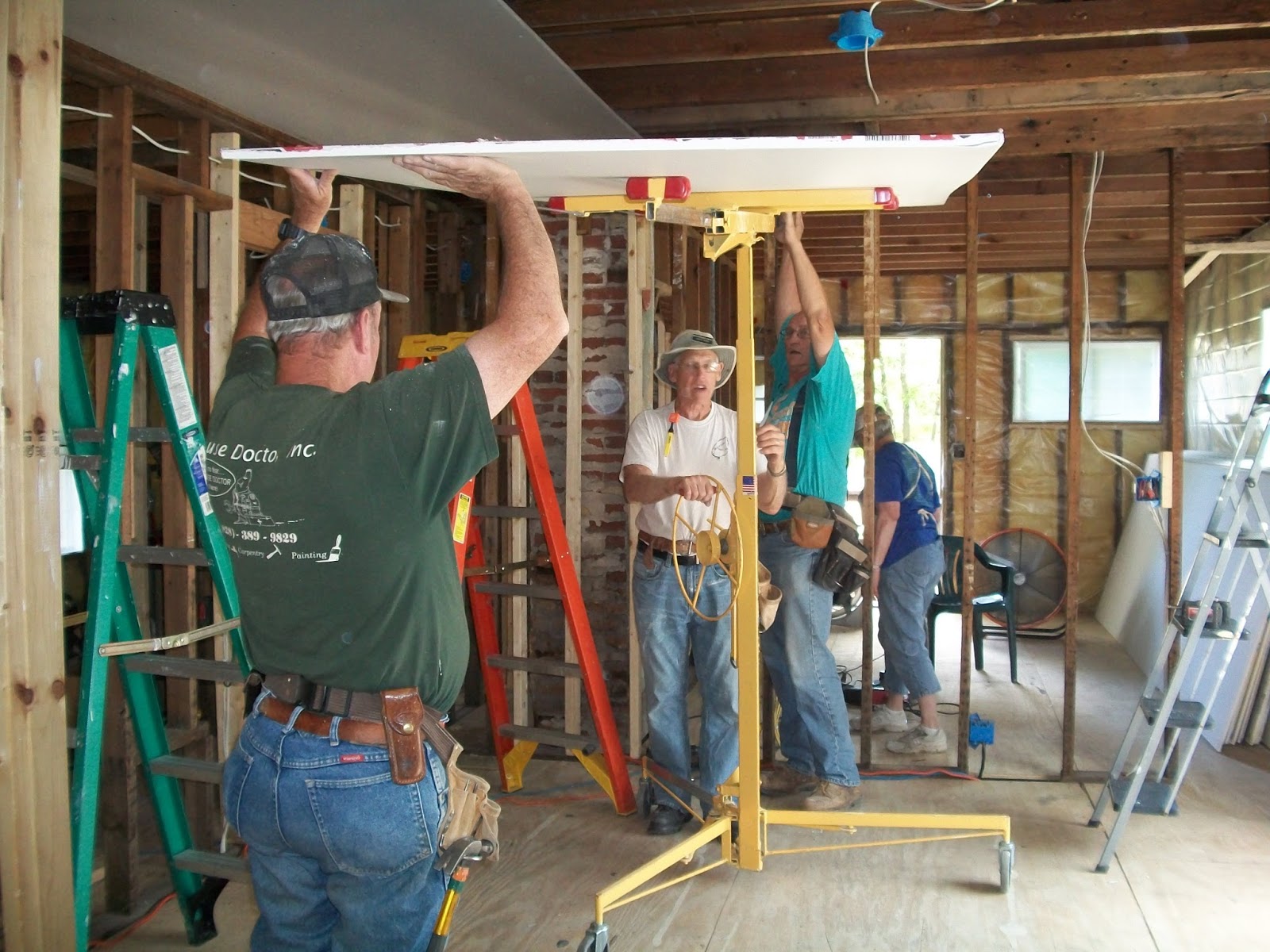 Here, There, and Just About Anywhere Putting up drywall