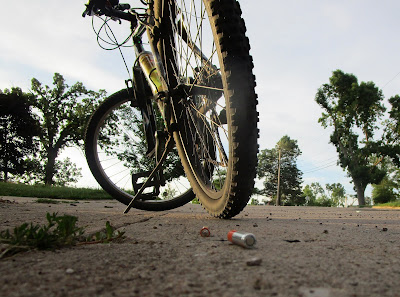 Batteries on street by wheel